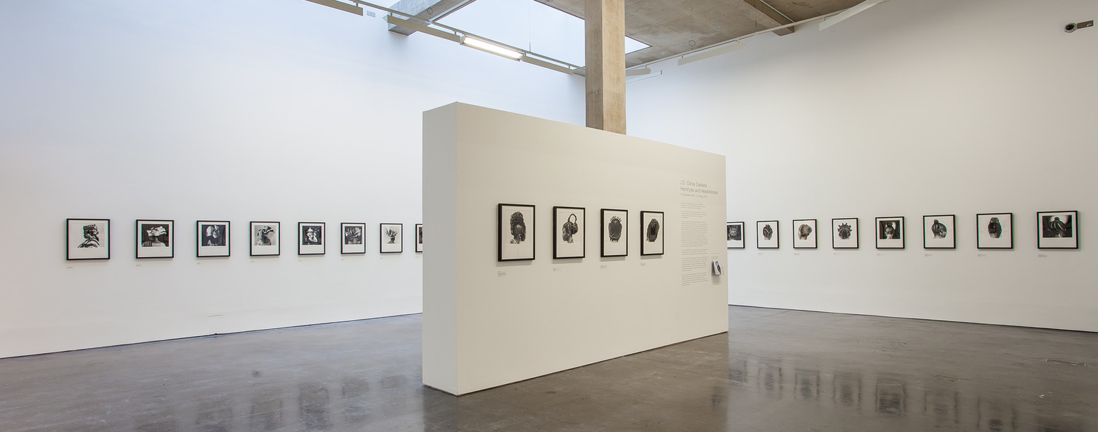 Installation View: J.D ‘Okjhai Ojeikere - Hairstyles and Headdresses, New Art Exchange, 27 September 2014 - 11 January 2015. Photo © Bartosz Kali. Installation View of J.D ‘Okjhai Ojeikere - Hairstyles and Headdresses